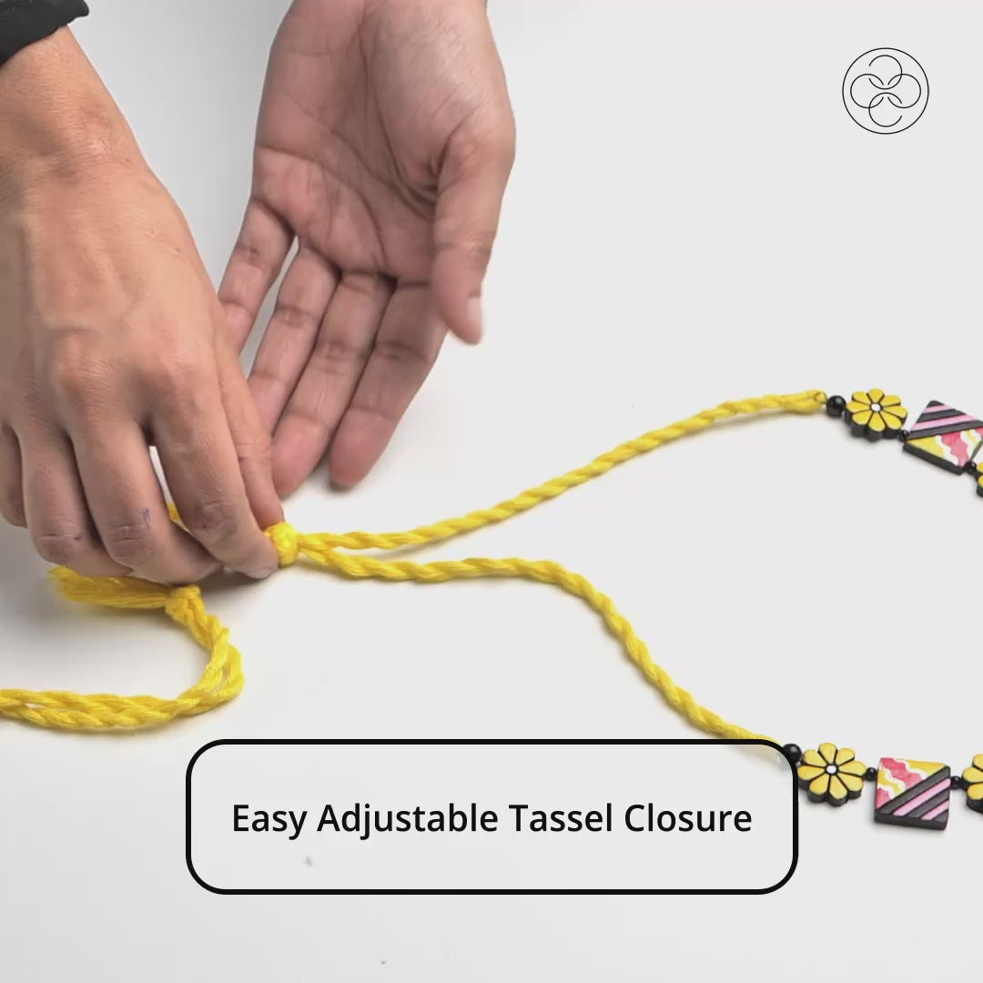 Video of handmade hand-painted terracotta jewelry sets by Cordelia Kraft